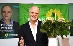 Thomas Poreski (Grüne) freut sich über das Wahlergebnis.