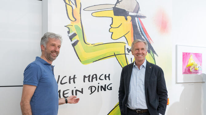 Alt-Bundespräsident Christian Wulff (rechts) hat zusammen mit Tübingens Oberbürgermeister Boris Palmer die Udo-Lindenberg-Ausste