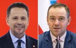  Rafal Trzaskowski (links), Kandidat der Bürgerlichen Koalition, tritt gegen den Nationalkonservativen Karol Nawrocki (rechts) a
