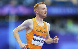 Hat im Mai den deutschen Rekord über 3.000 Meter Hindernis um acht Sekunden verbessert: Frederik  Ruppert.  FOTO: KAPPELER/DPA